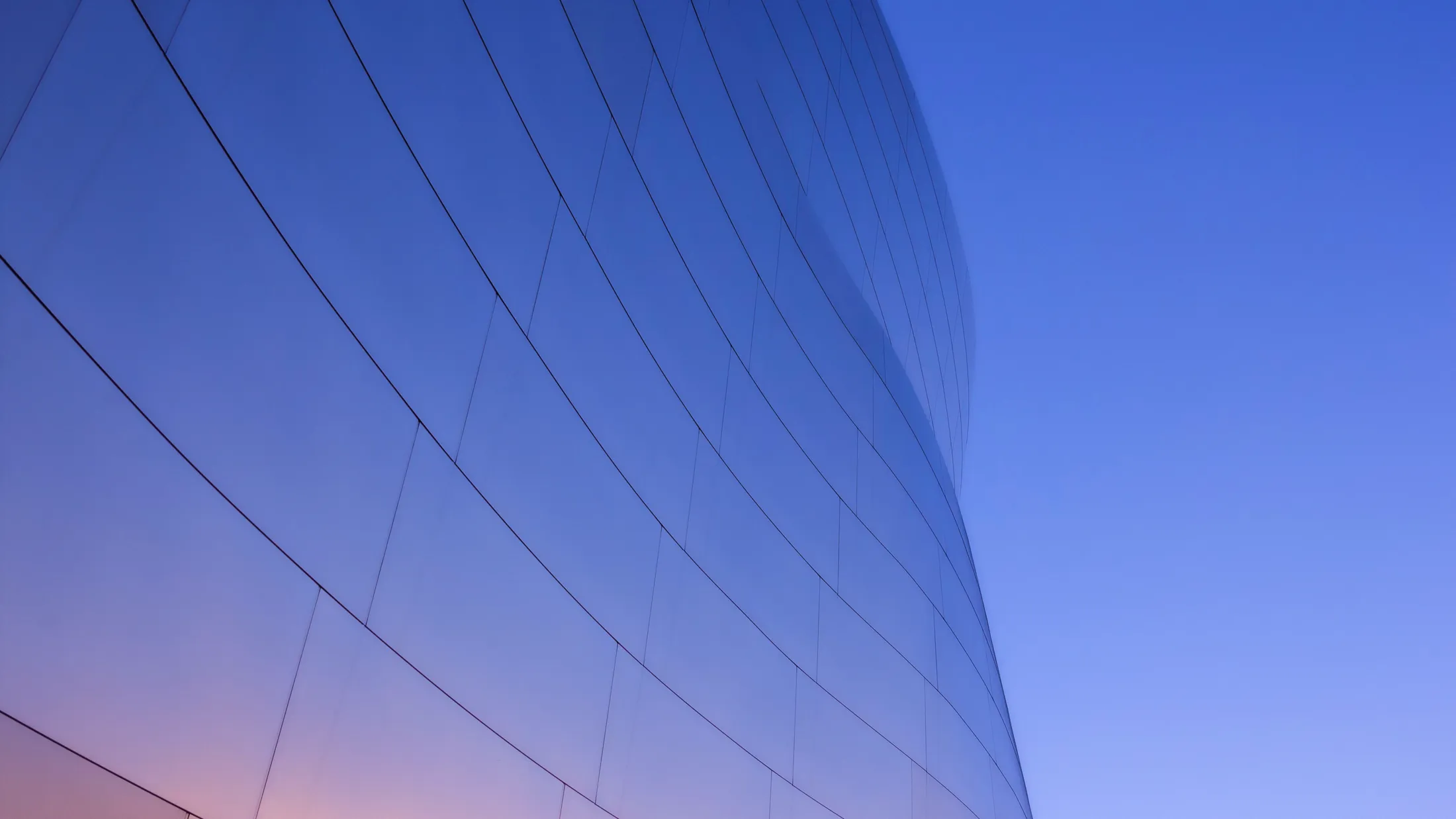 Investment — modern building facade at dusk